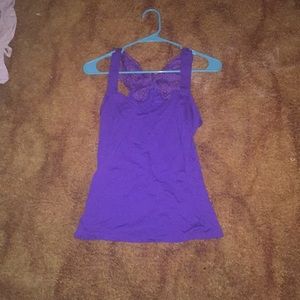 A tank top with a butterfly bank to it